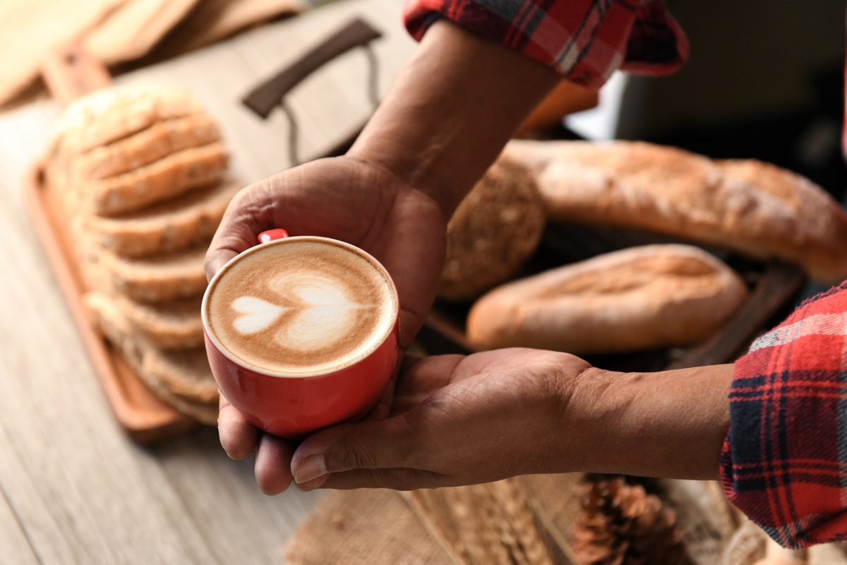 heart-latte-coffee-in-barista-hand-.jpg